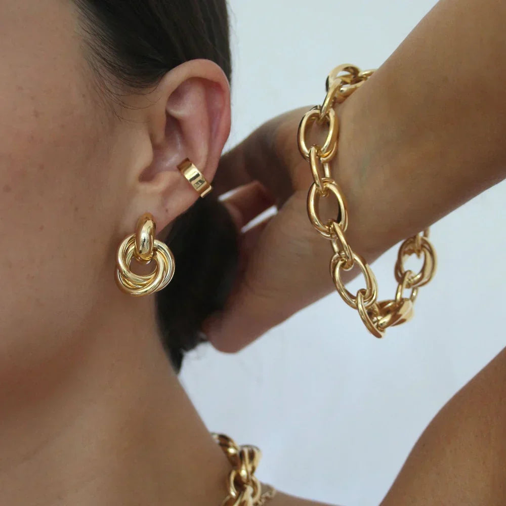 Pendientes Entrelazados Statement | Oro