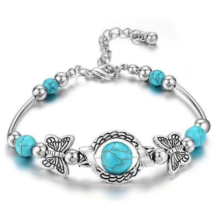 Pulsera Mariposa Oasis | Oro Blanco