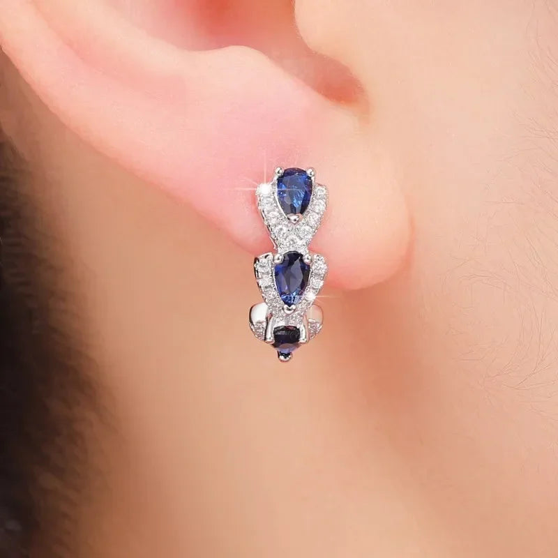 Pendientes Crest Zafiro Real | Oro Blanco