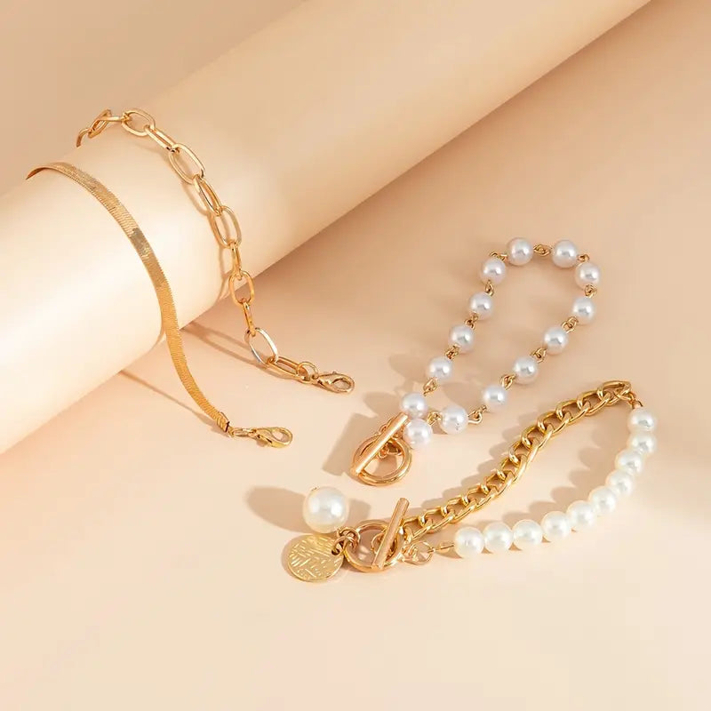 Set 4 Pulseras Chic - Serpiente, Perlas y Eslabones | Oro