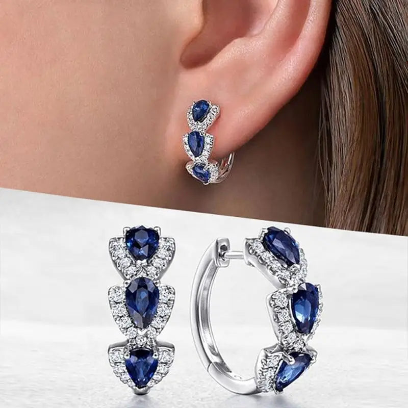 Pendientes Crest Zafiro Real | Oro Blanco