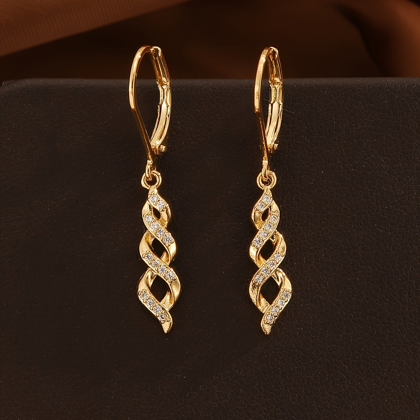 Pendientes Twist Shimmer Ava | Oro