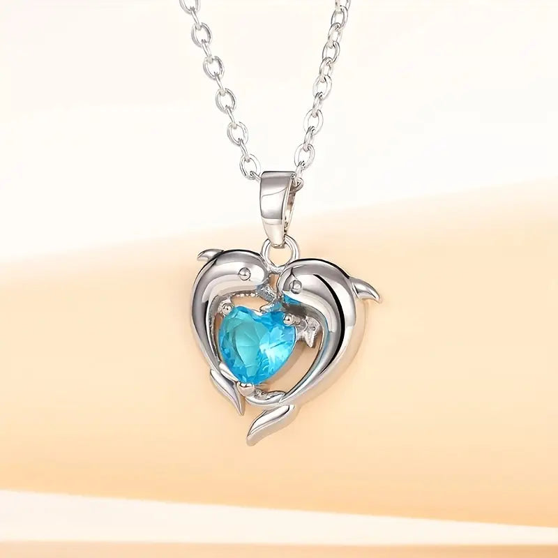 Collar Gemelos Corazón Oceánico | Oro Blanco