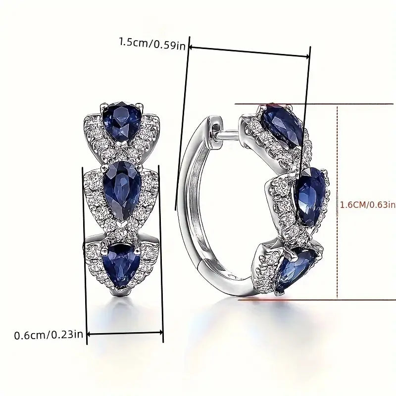 Pendientes Crest Zafiro Real | Oro Blanco